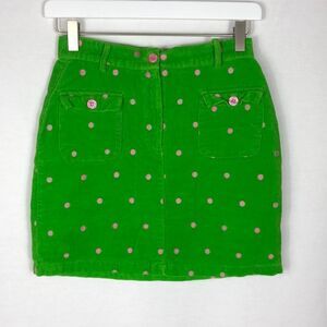 Nick Nack Patty Wack green skirt/pink polka dots